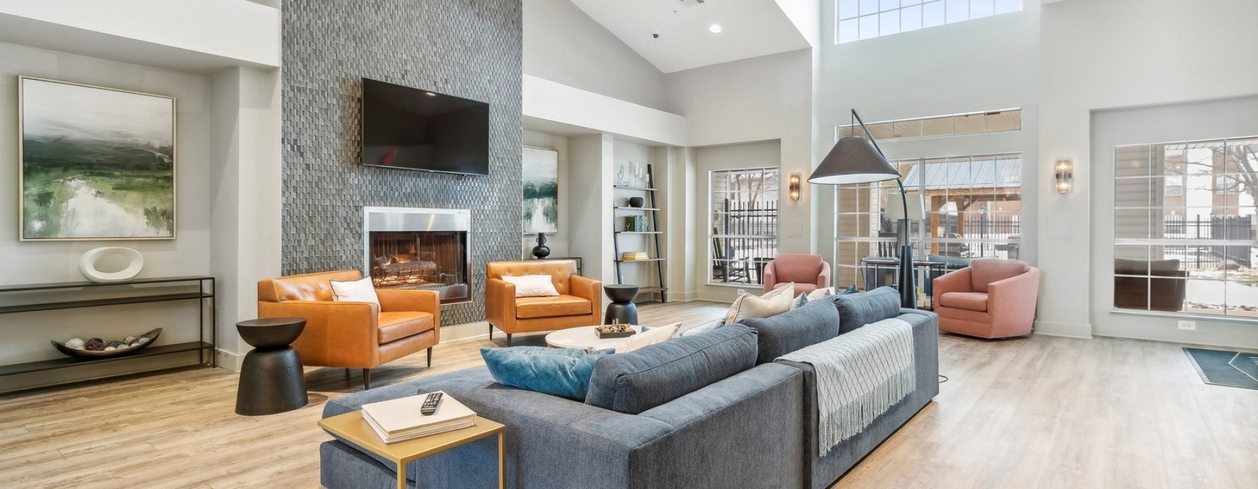 Beautiful clubroom with lounge seating and a media area
