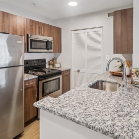 Beautiful kitchens with designer finishes Well-lit kitchen with ample counter space